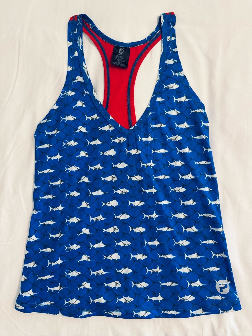 Pelagic Women’s Performance Racerback Tank -Americana Red, White and Blue
